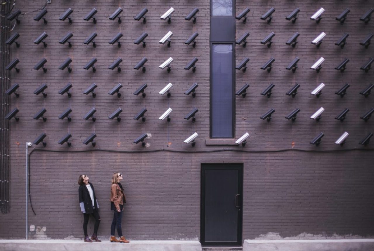 two-person-standing-under-lot-of-bullet-cctv-camera-374103