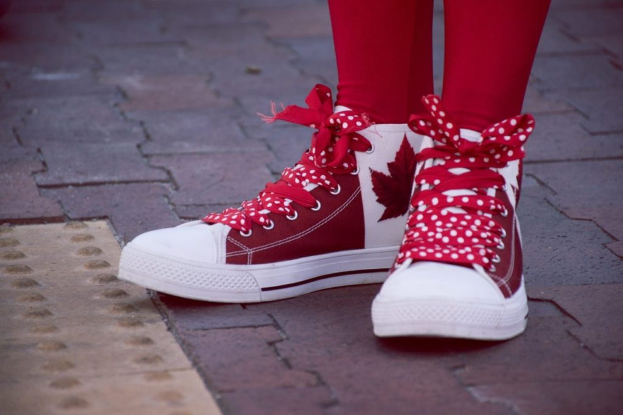 close-up-fashion-footwear-legs-with-canadian-flag-on-shoes-1151067