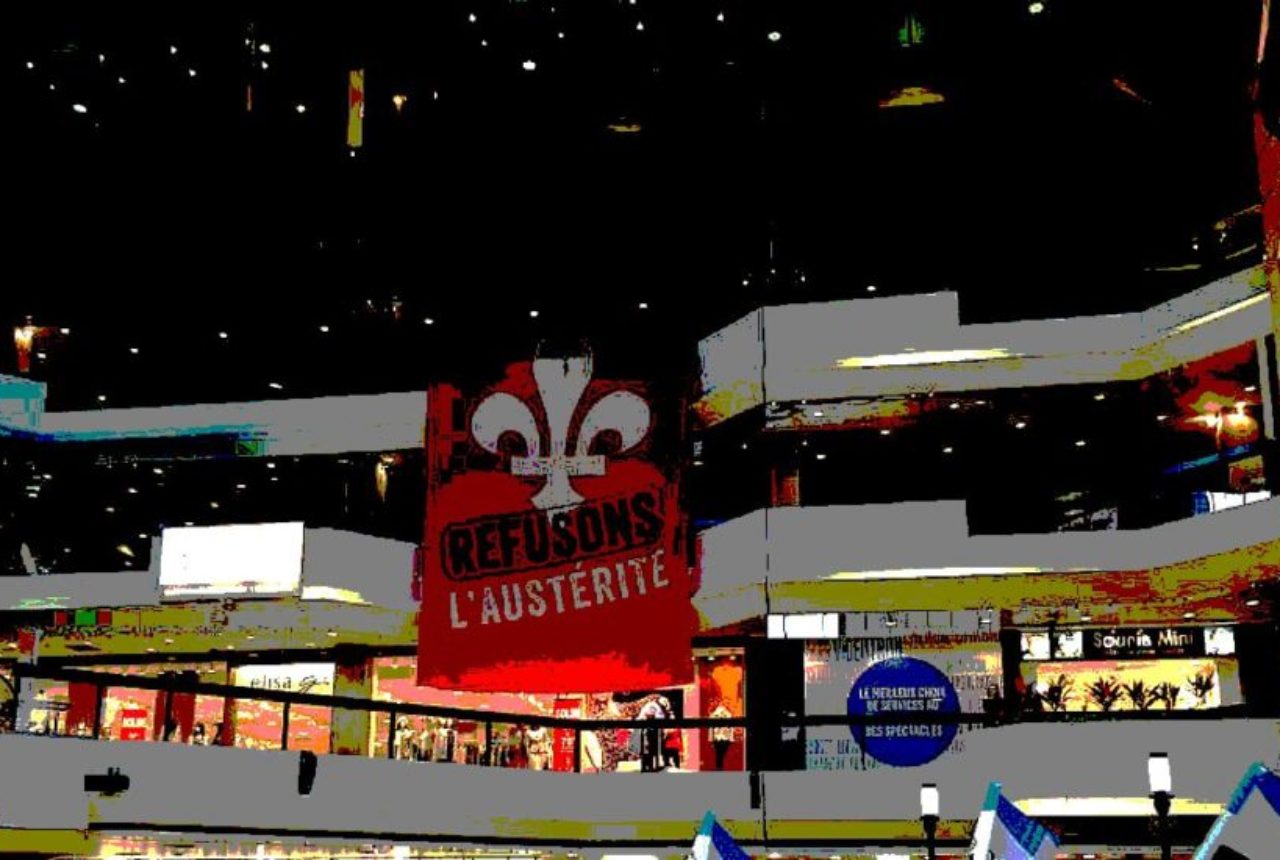 refuson-austerite-mobilization-banner-hanging-in-downtown-montreal-complex