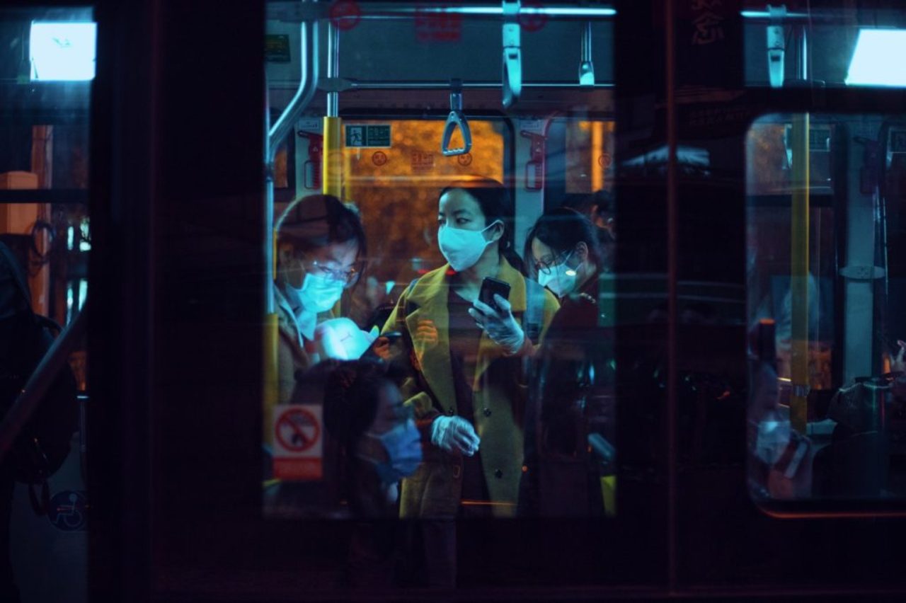 people-inside-a-bus-wearing-masks-3960076