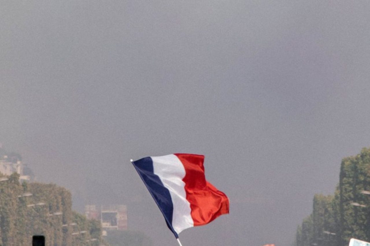 raising-the-blue-red-and-white-french-flag-2267338