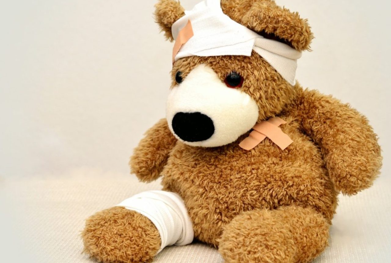brown-and-white-bear-plush-toy-