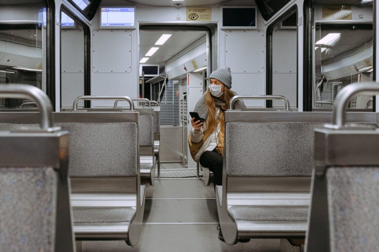 woman-wearing-mask-on-train-3962264